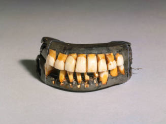 Dentures
Lead base, fitted with human teeth, as well as teeth cared from cow teeth and elephan ...