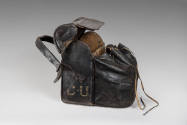 Canteen,
1758,
C.1: Leather, wood, iron, linen, copper alloy 
C.2: Iron, lead, tin