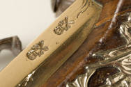 Flintlock pistol,
William Wooley (possible maker), 
1760-1770,
Walnut, steel, silver, iron,  ...