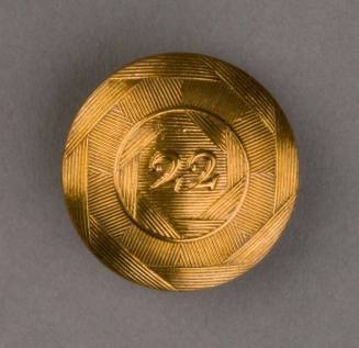 Button
Brass, bone, linen
c. 1775