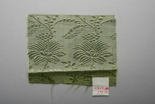 Green floral silk gown fragment