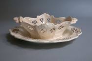 Fruit basket and stand
Maker:  Joshua Wedgewood and Sons
Earthenware, lead-glazed (creamware) ...